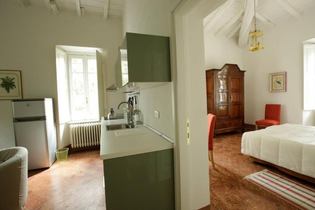 Bilocale Nel Parco Di Villa Erba เชอร์นอบบิโอ ภายนอก รูปภาพ